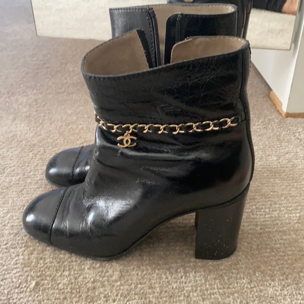 Chanel black leather boots with CC